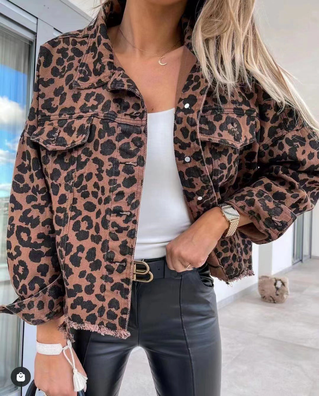 Women's Cropped Oversized Denim Jacket with Leopard Print, Patch Chest Pockets, and Raw Hem