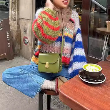 Women's Cozy Knit Sweater with Flared Sleeves and Colorful Stripe Pattern
