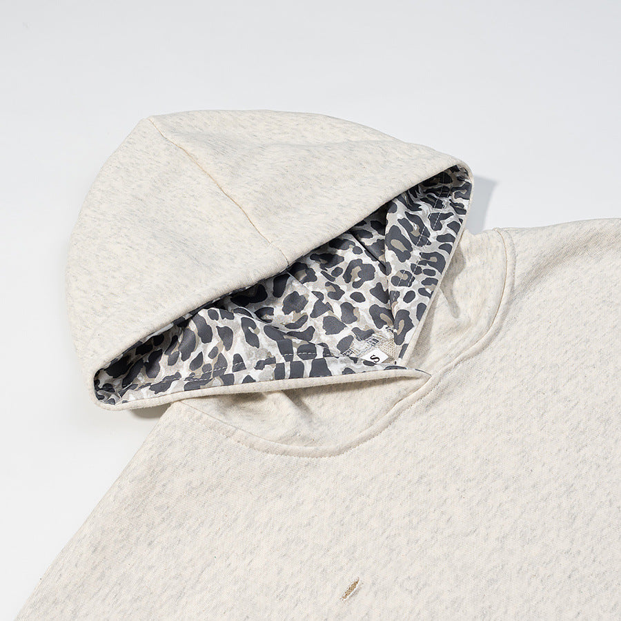 Women's Oversized Hoodie with Leopard Pattern Lining, Kangaroo Pocket, and Vintage Effect