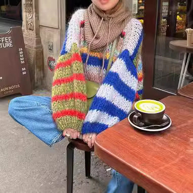 Women's Cozy Knit Sweater with Flared Sleeves and Colorful Stripe Pattern