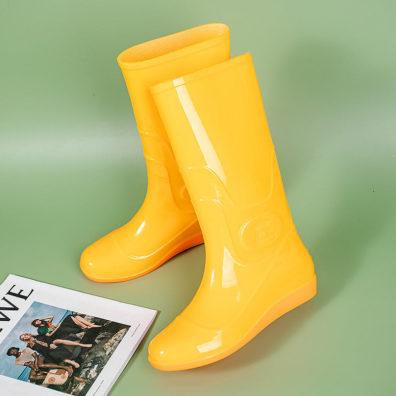 Women Shiny Mid-height Rain Boots made of PVC with a Lightweight Wedge Heel