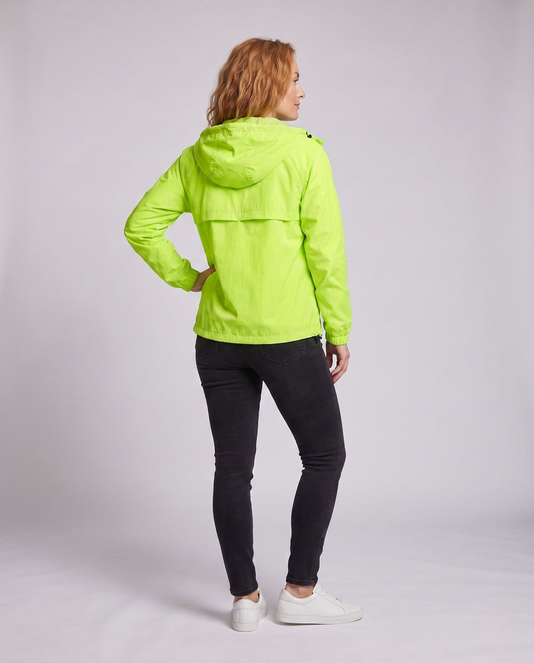 Women's High-performance Windbreaker with Reflective Elements and Adjustable Hood Design