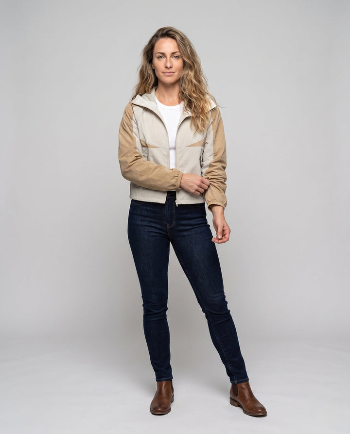Women's Lightweight Functional Jacket with Breathable Inserts and Adjustable Hood Design