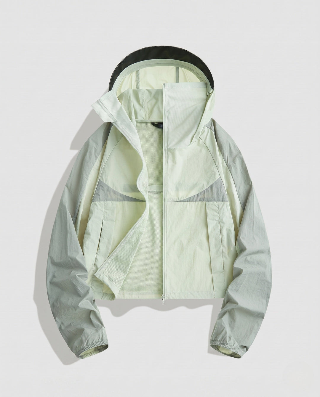 Women's Lightweight Functional Jacket with Breathable Inserts and Adjustable Hood Design