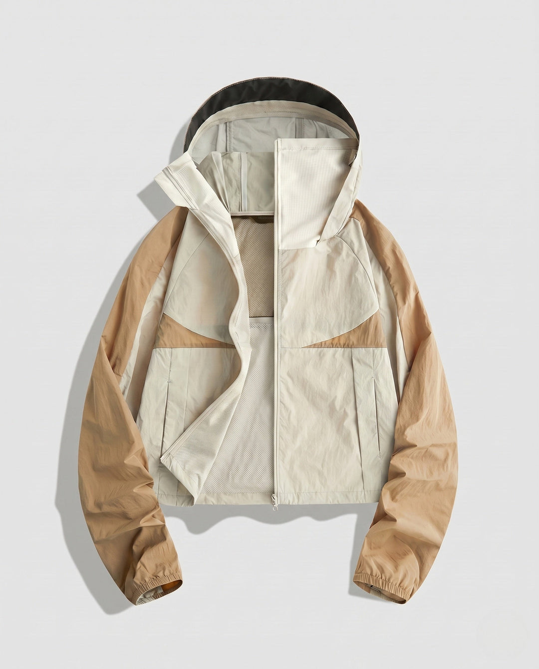 Women's Lightweight Functional Jacket with Breathable Inserts and Adjustable Hood Design
