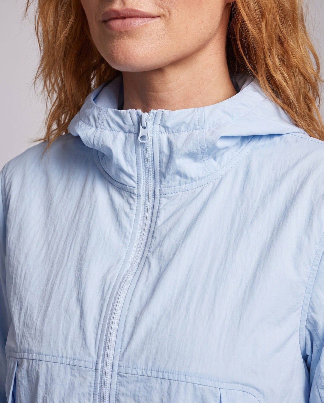 Women's Lightweight Windbreaker with Practical Cut and Breathable Inserts
