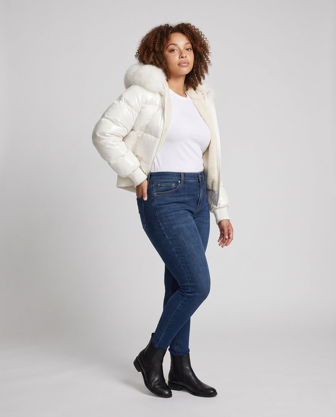 Women's Short Shiny Puffer Jacket with Oversized Faux Fur Hood and Teddy Lining