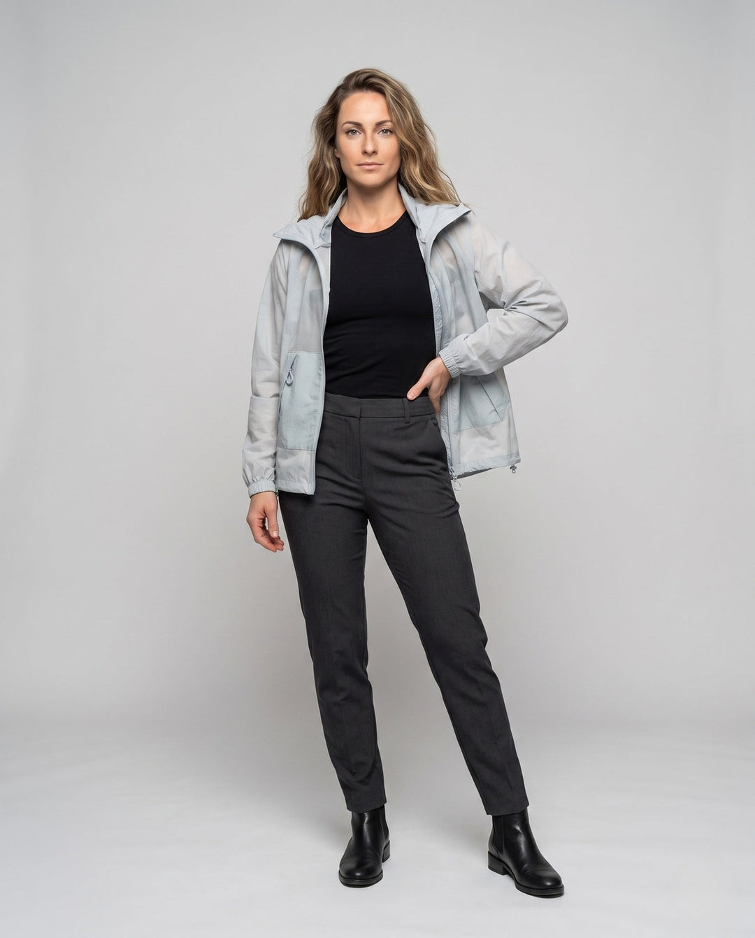 Women's Lightweight Windbreaker Jacket with Adjustable Hood Design and Side Pockets