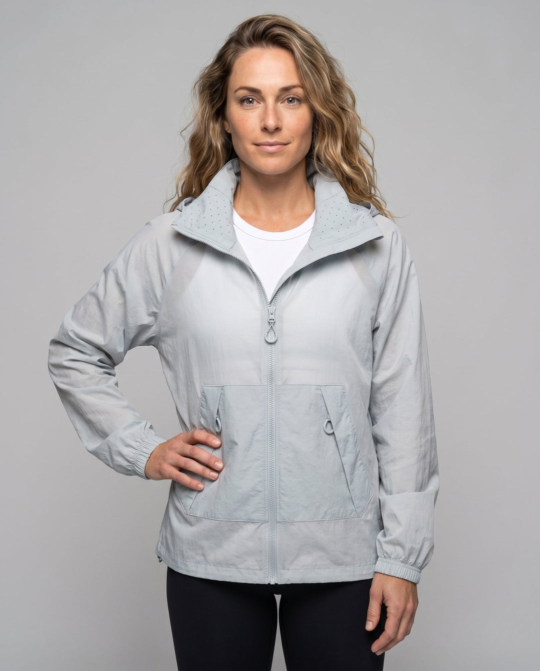 Women's Lightweight Windbreaker Jacket with Adjustable Hood Design and Side Pockets