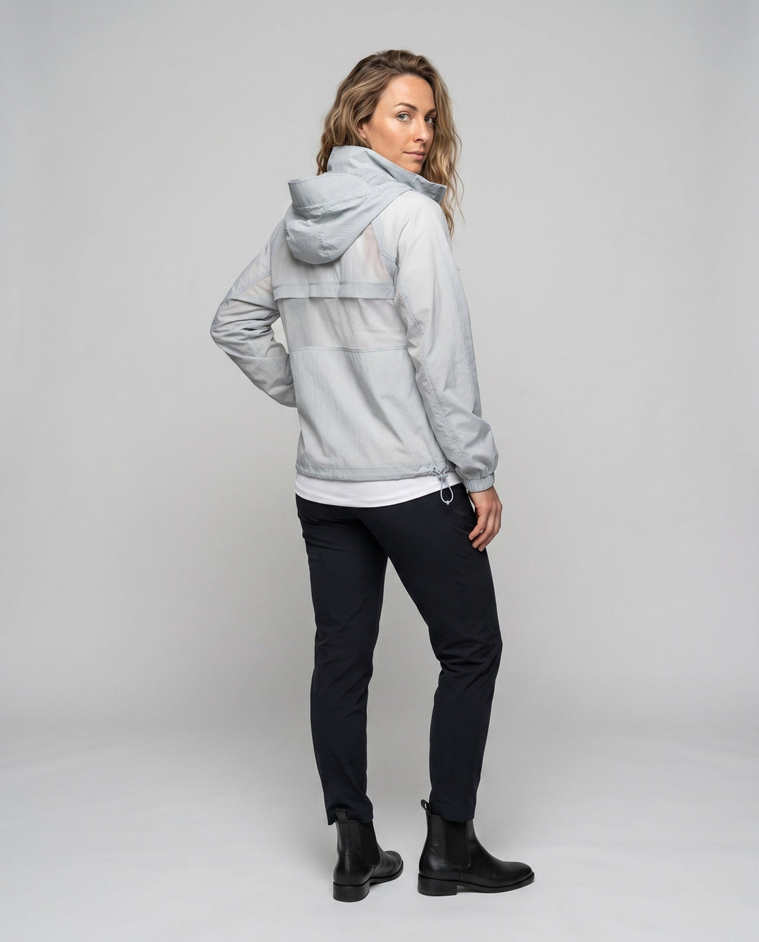 Women's Lightweight Windbreaker Jacket with Adjustable Hood Design and Side Pockets